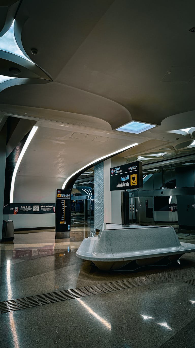 Interior view of a modern metro station in Doha, Qatar with contemporary design elements.