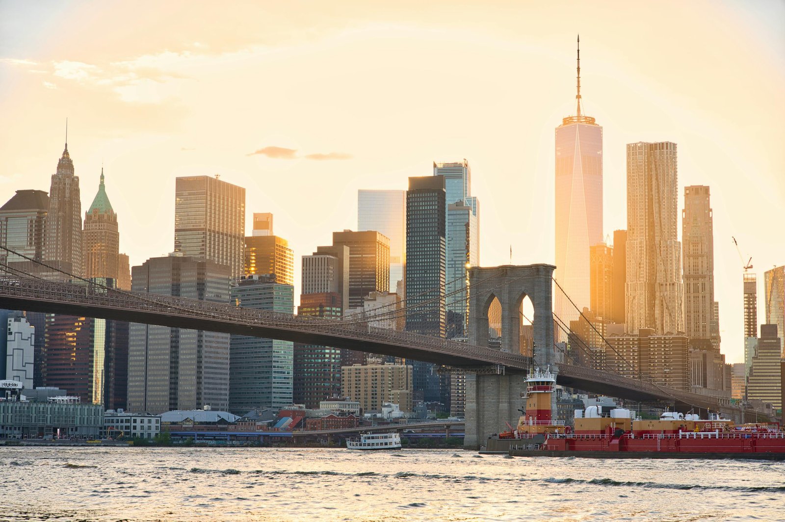 Brooklyn Bridge and NYC skyline at sunset