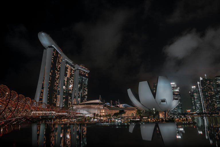Stunning night view of Marina Bay Sands with reflections in Singapore's skyline.