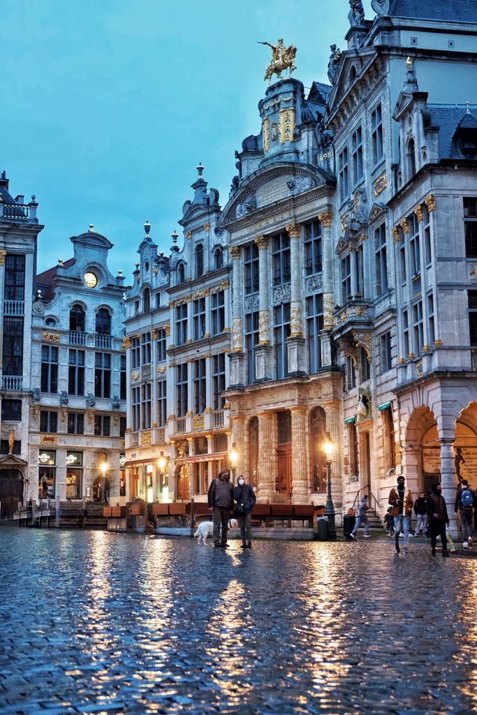 Beautiful evening view of Grand Place, Brussels with illuminated historical architecture.