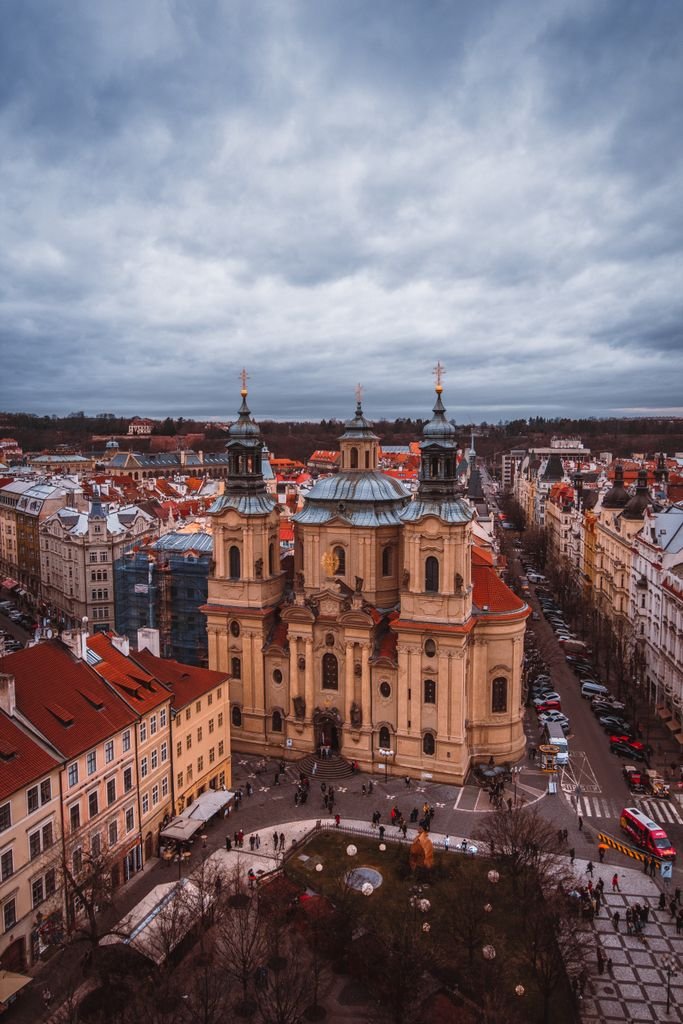 Stunning aerial view of Church of St. Nicholas in historical Prague. Perfect for travel and architecture enthusiasts.