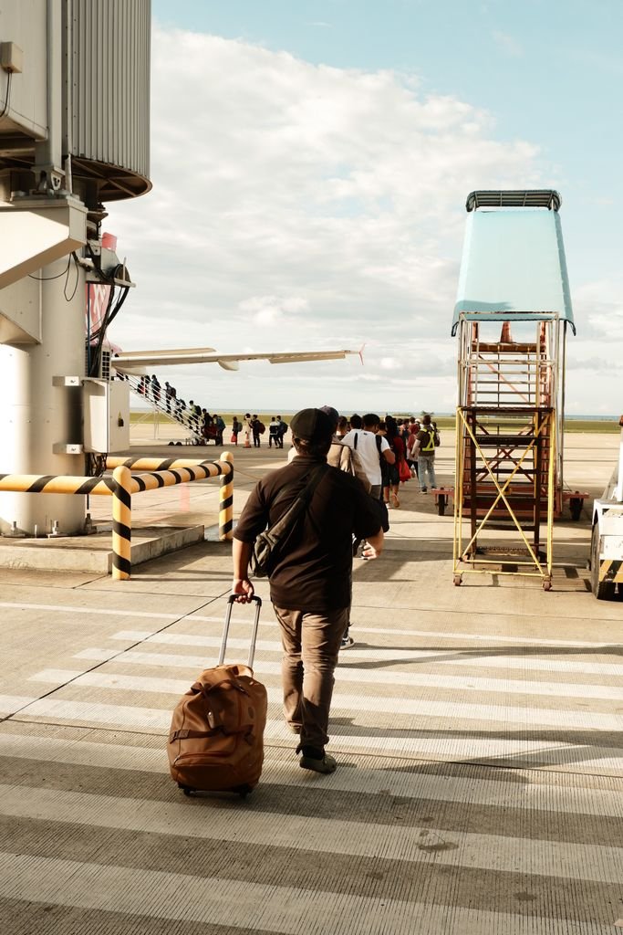 Traveler hurrying through a terminal to make a tight connection